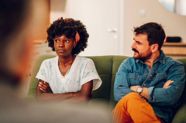 istock Diverse couple on a therapy session in a psychologist office 1467876390