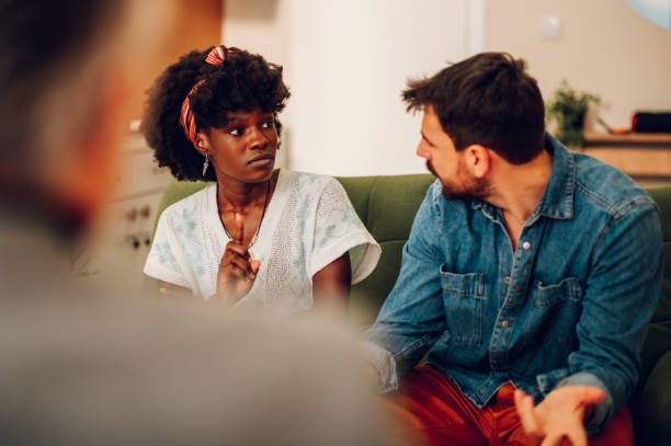 istock Diverse couple on a therapy session in a psychologist office 1467876392