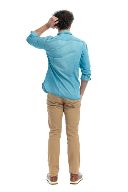 istock confused casual guy standing, scratching head and thinking 1467876947