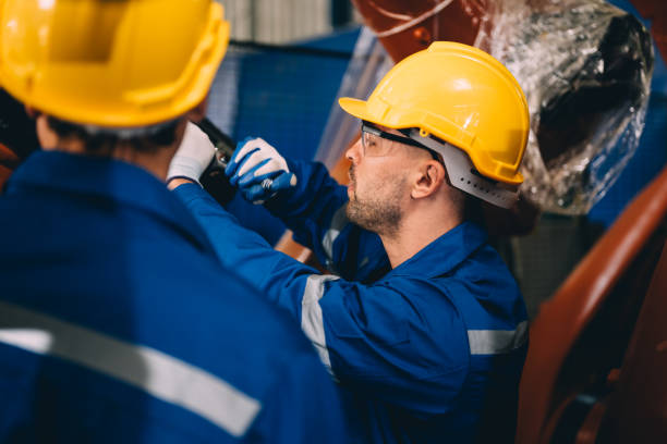 istock Professional worker maintenance machine robotic arms industrial machinery 1467877759