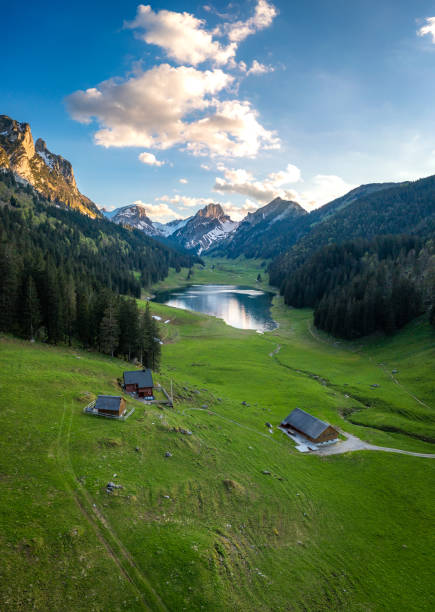 istock A farm in the valley next to a mountain lake 1467882048