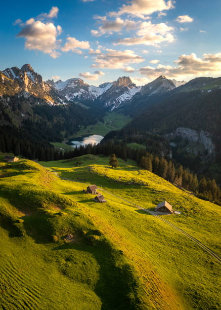 istock A farm in the valley next to a mountain lake 1467882097