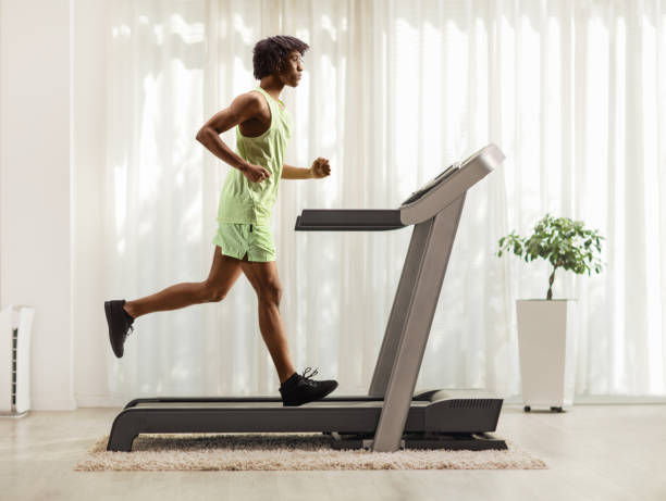istock African american guy running on a treadmill at home 1467882808