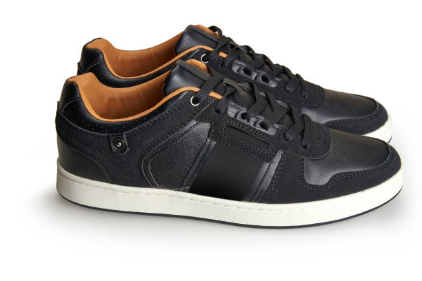 istock A pair of black leather shoes view from side. 1467883971
