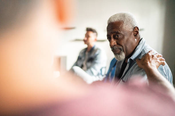 Senior man receiving a advice during a psychotherapy