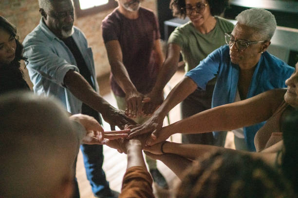 istock Business team holding their hands together 1467884414