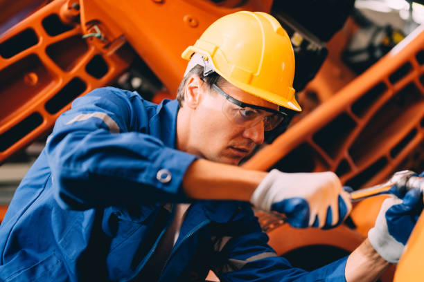 istock Professional worker maintenance machine robotic arms industrial machinery 1467884921