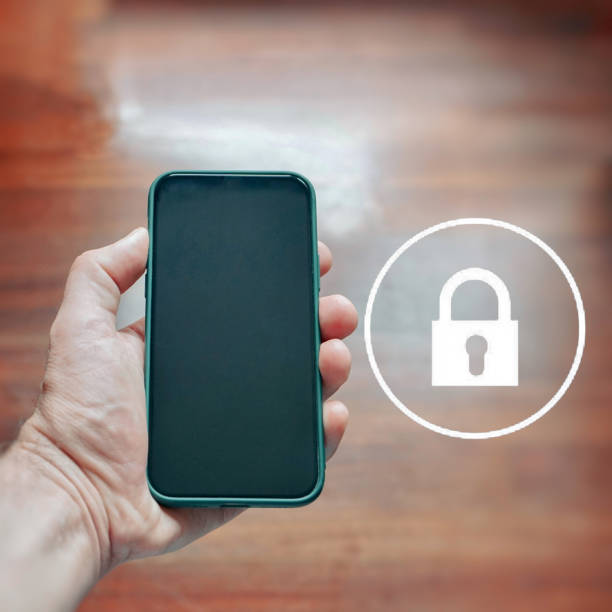 istock hand holding a phone with a padlock security symbol 1467889660