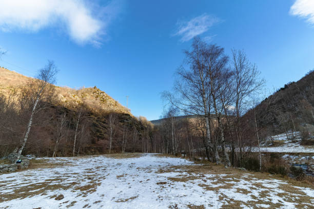 istock Snowy landscape with mountains and sun, snow 1467890533