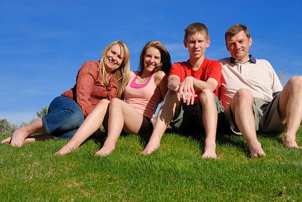 Family on grass stock photo