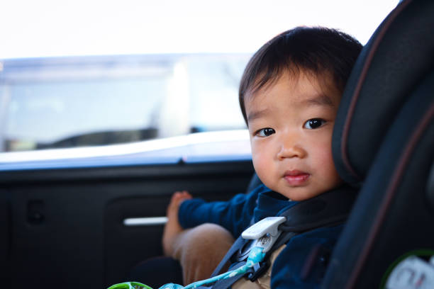 istock Baby in car seat 1467890713