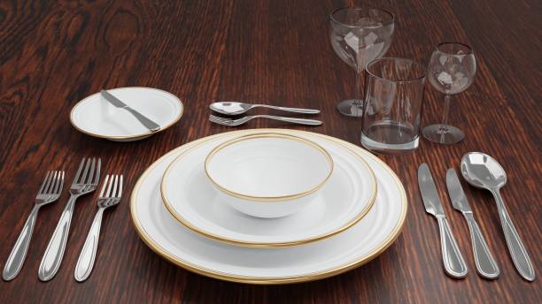 istock Table setting with cutlery, empty wine glass, empty water glass on wooden table. 1467893640
