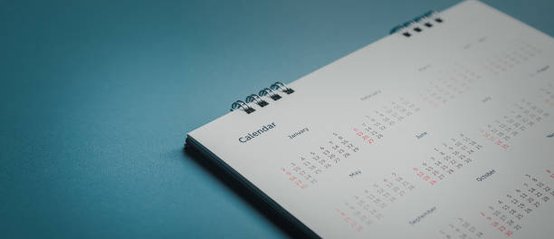 istock Embroidered red pins on a calendar event Planner calendar,clock to set timetable organize schedule,planning for business meeting or travel planning concept. 1467893690