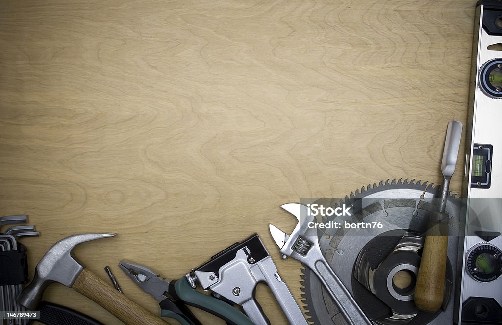 Tools on a wooden background Tools on a wooden background, сan serve as a background Adjustable Stock Photo