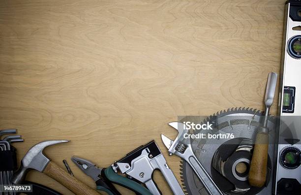 Tools On A Wooden Background Stock Photo - Download Image Now - Adjustable, Adjustable Wrench, Chisel