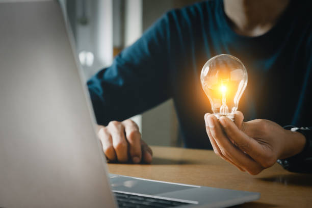 istock Close up hand choose light bulb or lamp with bright for human resources or leadership and creativity thinking idea motivation or vision and knowledge learning. 1467894776