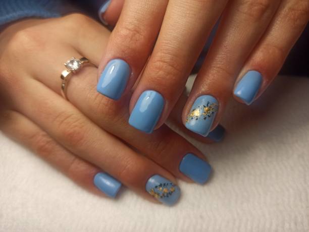istock Female hands with a beautiful manicure 1467895499