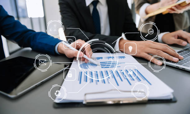istock Working team meeting concept, business using laptop and smart phone and digital tablet computer with digital marketing media  in virtual icon network diagram office 1467897296