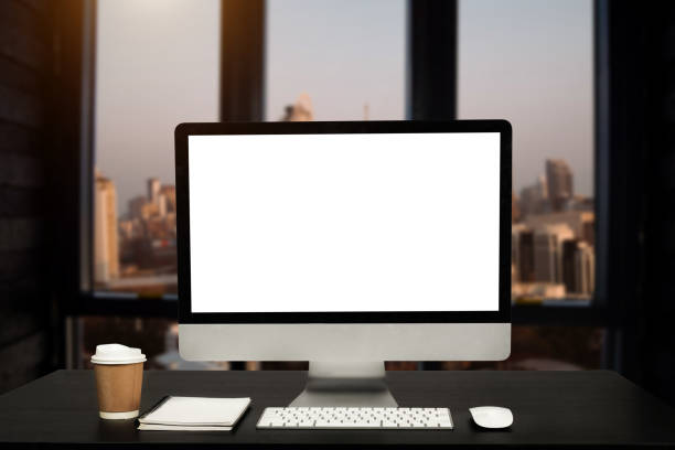 istock workspace with computer, laptop, office supplies, and coffee cup, smartphone, and tablet at office. desk work concept. 1467897971