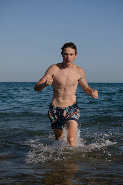 istock A 17 Year Old Teenage Boy Walking 1467899835