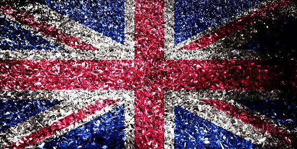 Double exposure of creepy Union Jack flag. Basemap or background use. British flag double exposure creative hologram.