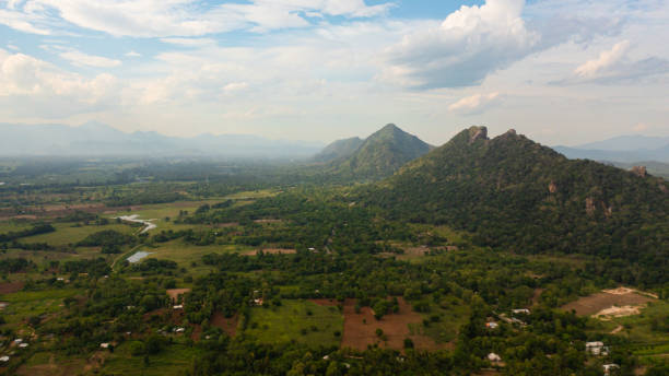 istock Tropical mountain range and mountain slopes with rainforest. Sri Lanka. 1467903327