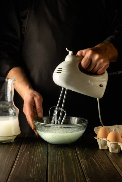 istock The chef uses a hand-held electric mixer to prepare a delicious breakfast or lunch with eggs and milk. Menu idea for a restaurant or hotel 1467904367