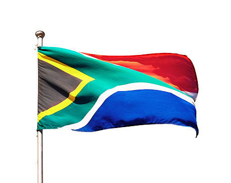 South African flag flies in a strong wind on a pure white background.