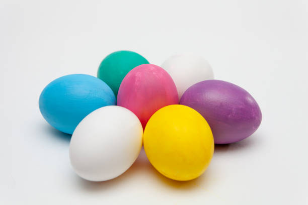 istock Seven colorful handmade Easter eggs, isolated on white background 1467907770