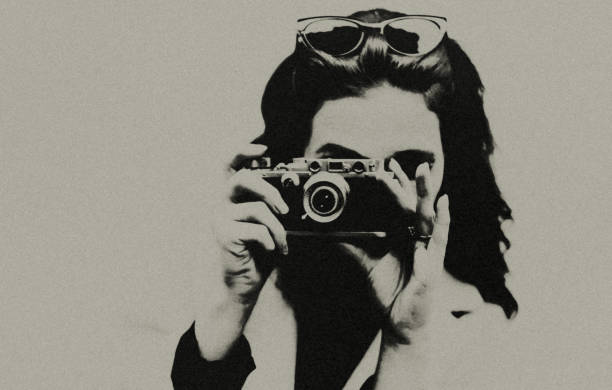 istock The female photographer. 1467907804