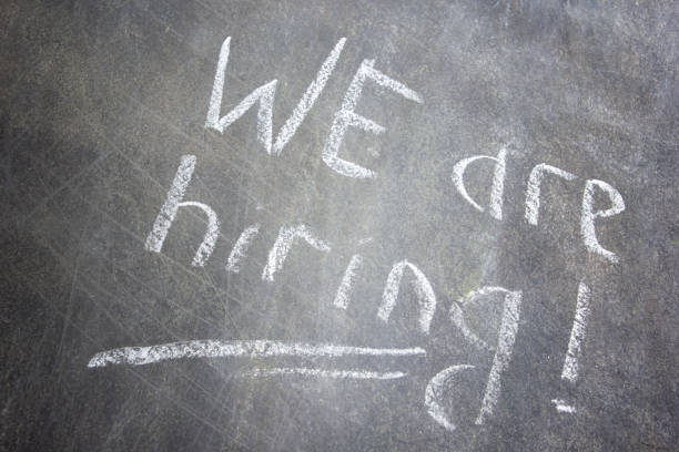 istock Text We are hiring handwritten with white chalk on a blackboard 1467908925