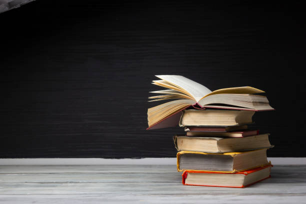 istock Vintage old hardback books. Education background. Back to school. Copy Space. 1467910799