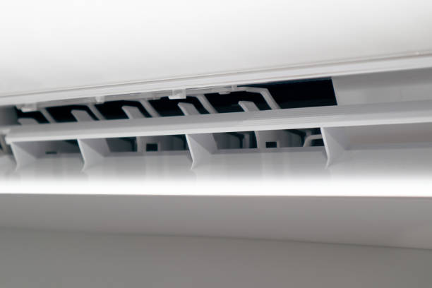 istock Air Conditioning Isolated on White Background. Modern Indoor Blocks of Split System Air Conditioner. Side View Close-up. 1467920392