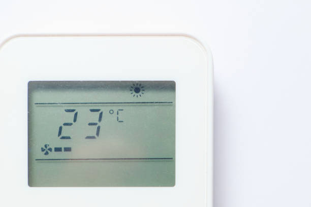 istock Remote control of modern air conditioner. 23 C degree. 1467920424