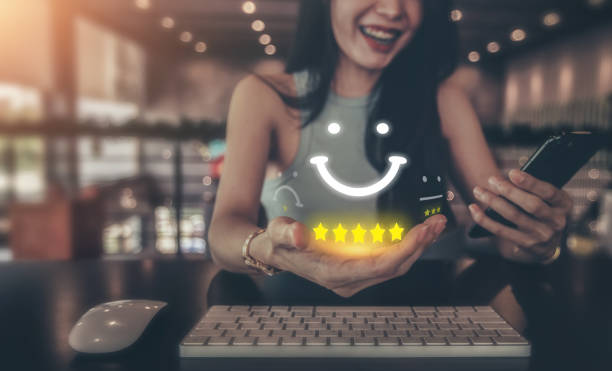Customer, Happiness, Satisfaction, Service, Feedback,Feedback, Rating, Customer, Examining, Service Businesswoman holding a smiley icon for best evaluation customer satisfaction concept product review stock pictures, royalty-free photos & images