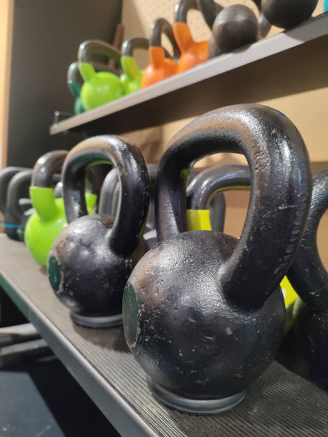 istock Black kettlebells on a racks in a gym 1467921760