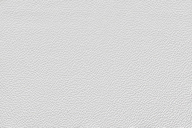 istock White paper wallpaper texture with abstract raised cells. Plastered embossed wall. 1467924855