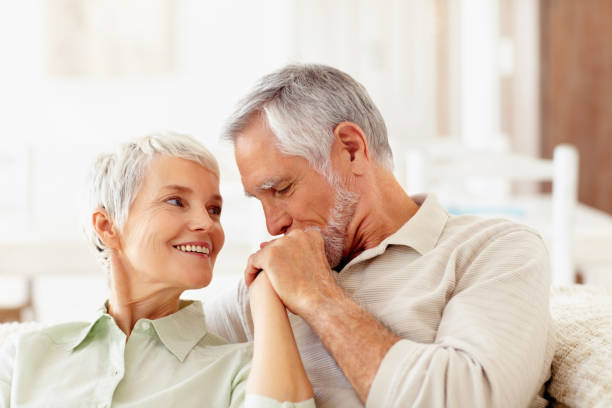 istock Loving moment between senior couple at home 146792867