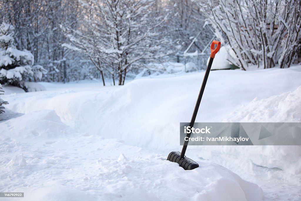 Shovel in snow Blizzard Stock Photo