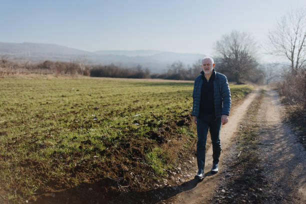 istock Business professional walking in the countryside 1467929890