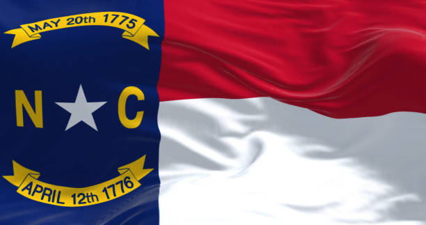 istock North Carolina state flag waving in the wind 1467930046