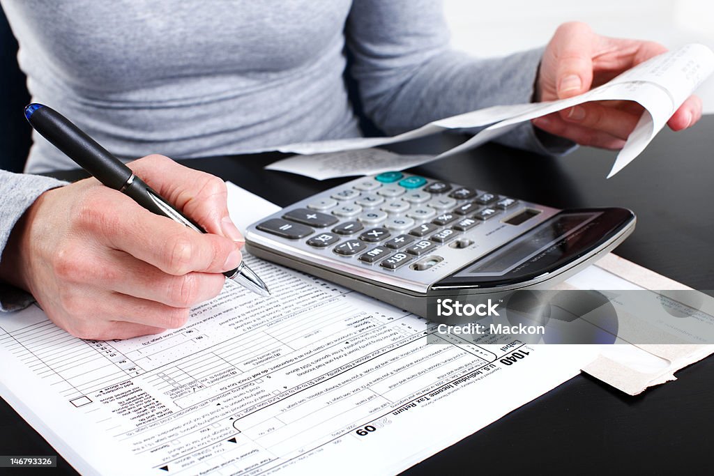 business woman business woman working with documents Tax Form Stock Photo