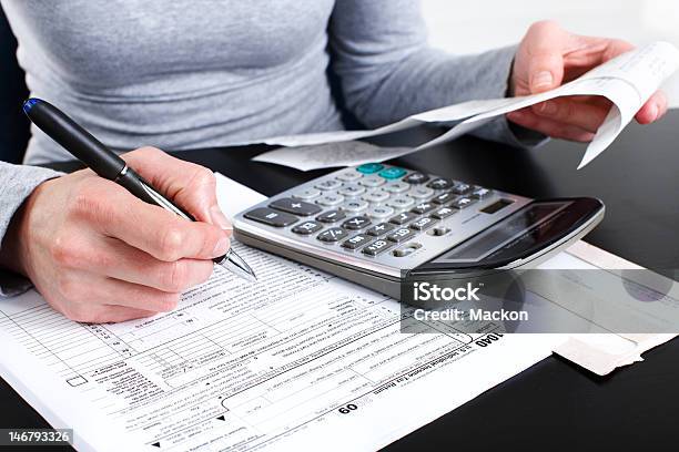Business Woman Stock Photo - Download Image Now - Tax Form, Tax, Business