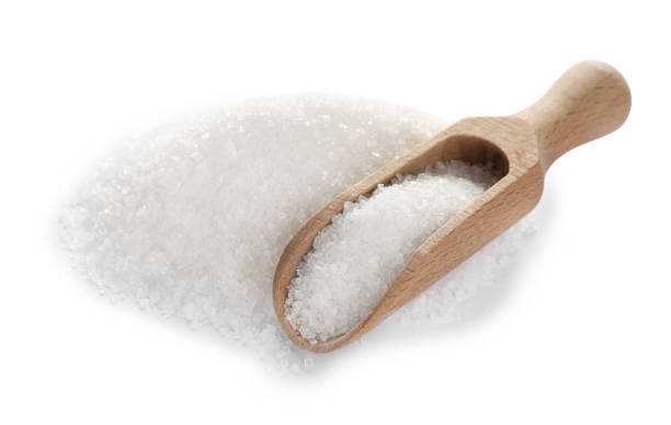 istock Wooden scoop and granulated sugar isolated on white 1467938344