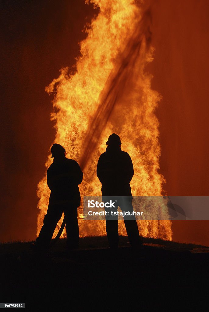 Los bomberos en el trabajo - Foto de stock de Incendio forestal libre de derechos