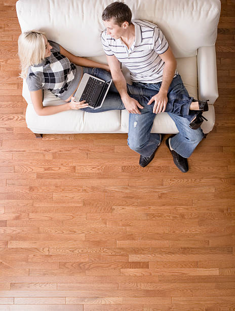 istock Overhead View of Couple Relaxing on Couch 146794031