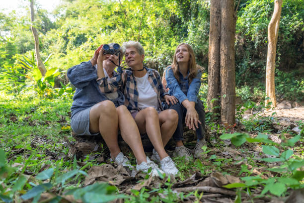 istock Caucasian family sitting and resting during a hike. 1467942155