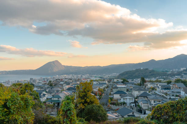 Sunset view of Beppu city and sea in Oita, Japan stock photo
