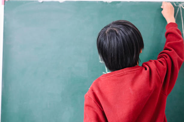 istock Kids education knowledge, Child in classroom at school 1467944156