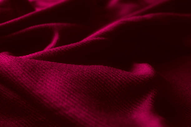 istock Fabric texture background of magenta color (Viva Magenta). 1467945195